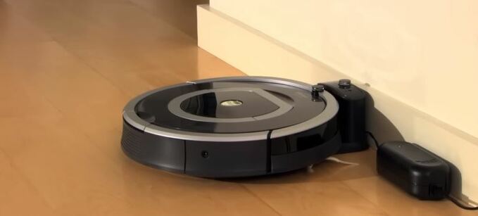 How do you charge a robot vacuum cleaner?